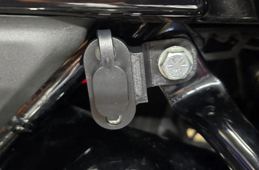 Charging port lower mount bracket for newer touring models