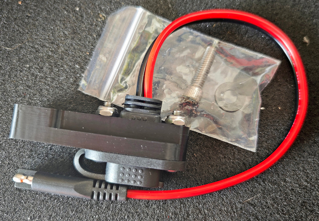 Charging port top mount bracket for touring bikes
